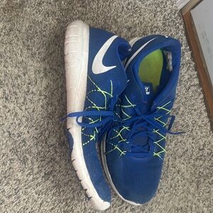 Nike Blue and Green Sneakers with Sporty Design
